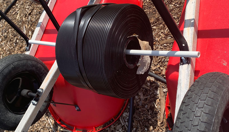 unroll unrolling drip irrigation line