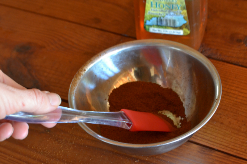 mix honey into ground herb