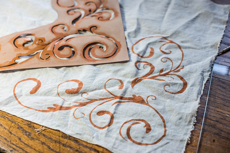 You can stamp your fabric using stencils.